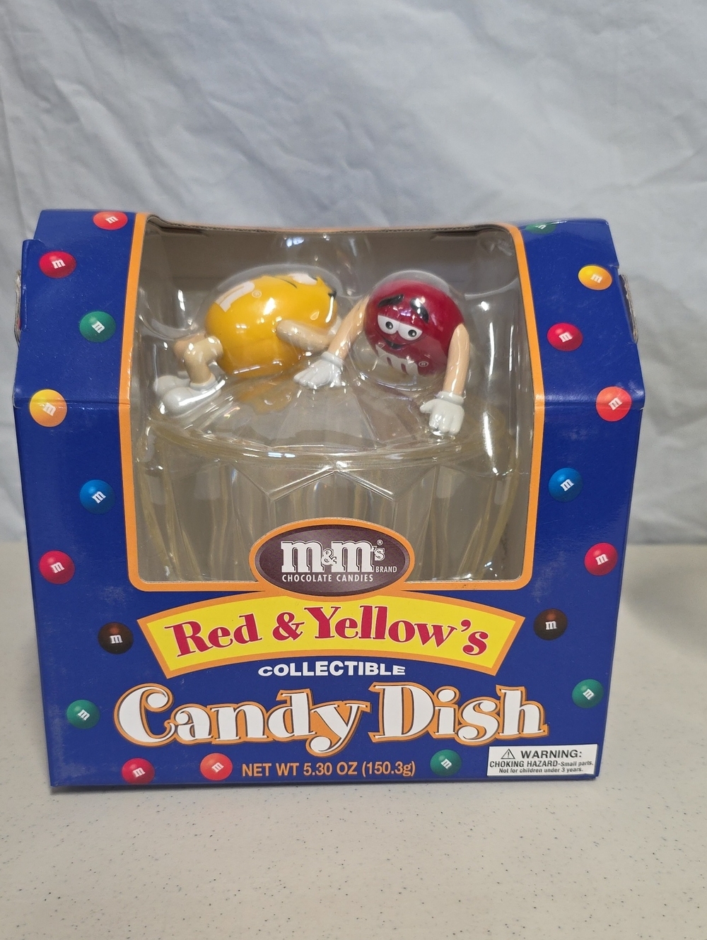 M&M's branded collectible candy dish featuring Red and Yellow characters